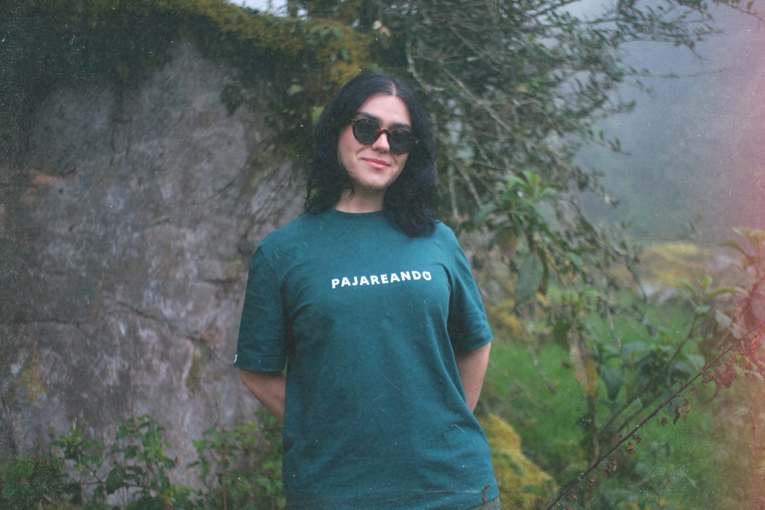 Portrait wearing the tee in the misty forest.